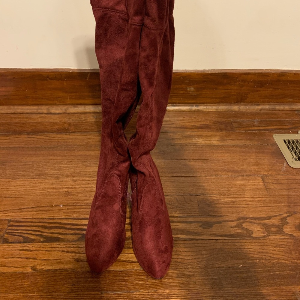 Thigh high faux suede boots.